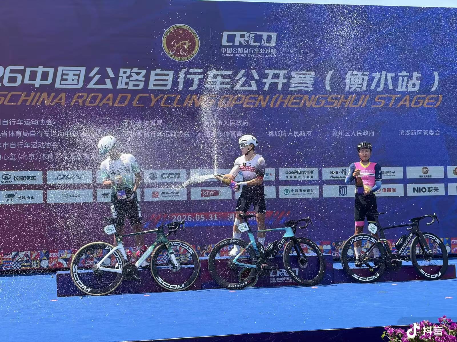 Podium spray at China Road Cycling Open