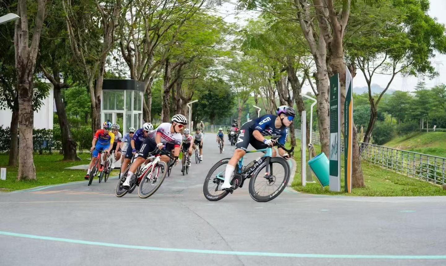 Race finish award photo with LaBrota bike
