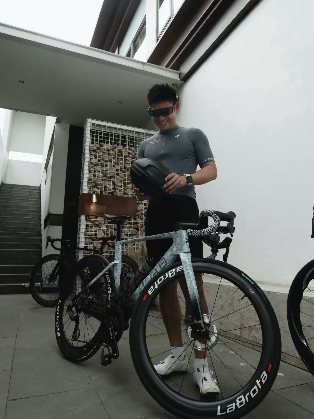 Captain Cola riding LaBrota bike in aero position on road